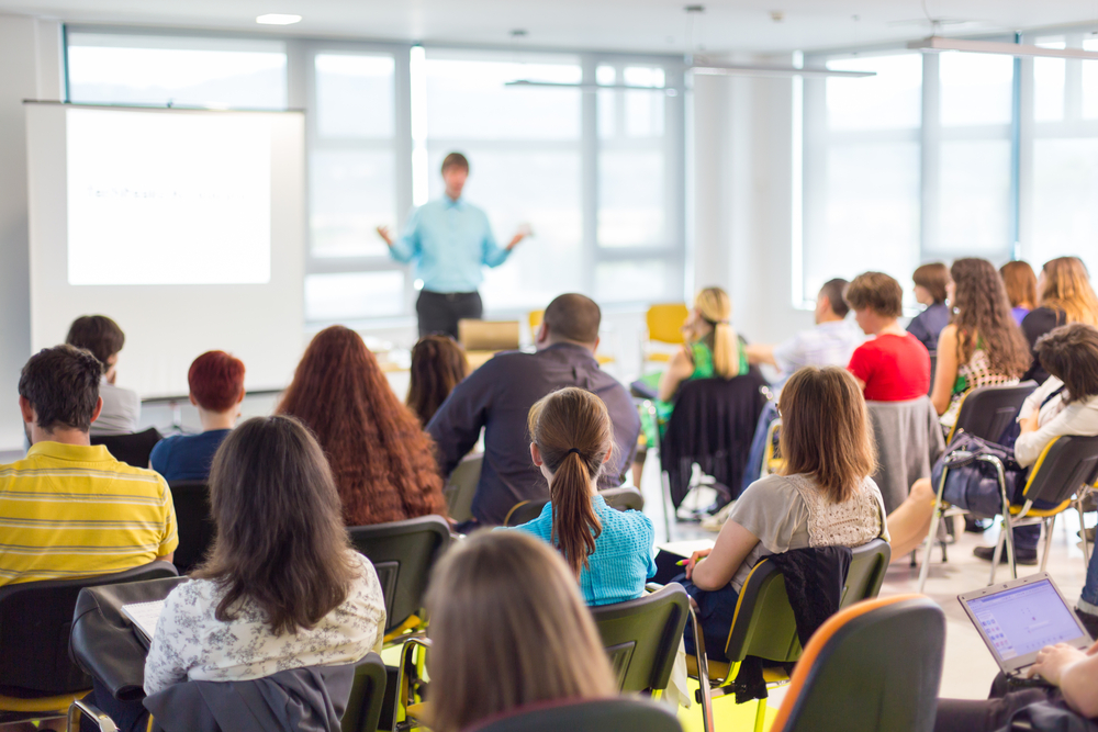 Business,And,Entrepreneurship,Symposium.,Speaker,Giving,A,Talk,At,Business